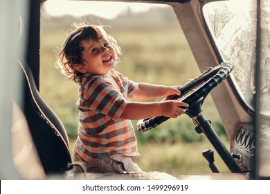 Little Baby driving a truck