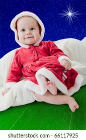 Little baby girl in Christmas dress