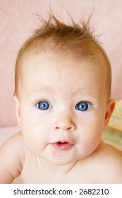 Little Baby Girl with hair stuck up taken closeup - Shutterstock ID 2682210