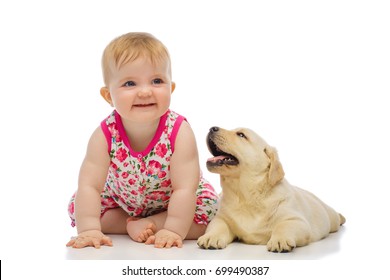 Little Baby Girl With Labrador Puppy, Isolated On White