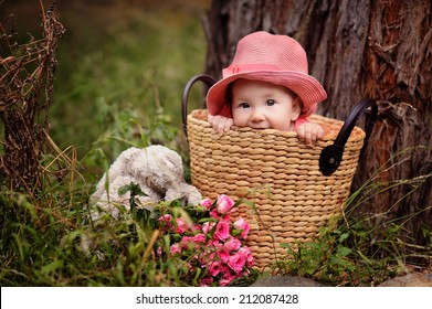 Little Baby Girl Playing Peekaboo Outdoor