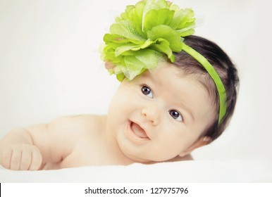 Little baby with green flower color