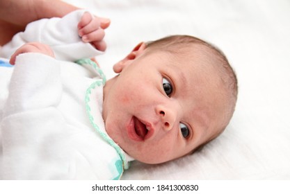 Little Baby Looking After Having A Good Night Sleep On White Background