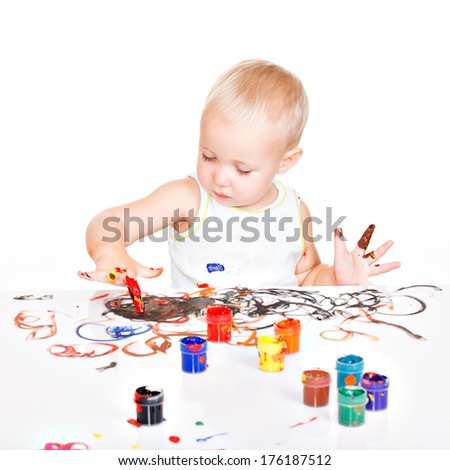 Similar – Baby Mädchen spielt mit Haarspangen, die auf dem Boden liegen.