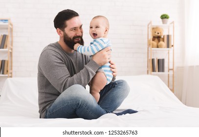 Little Baby Playing With Daddy Beard And Laughing, Copy Space