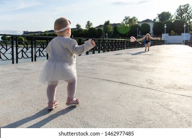 Little Baby Running Towards Mom