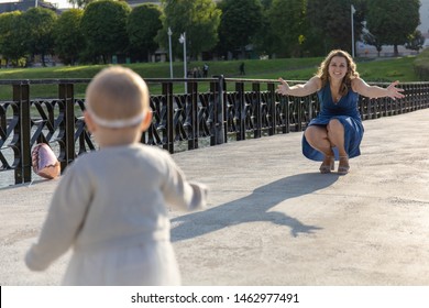 Little Baby Running Towards Mom