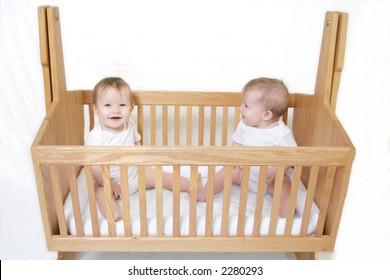 twins in one cot