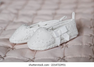 Little Baby Shoes On A Blanket