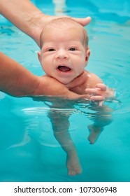 Little Baby Swimming In Water