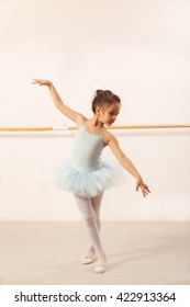 Little Ballerina Girl Dancing In Ballet Studio