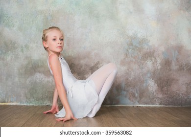 Similar Images, Stock Photos & Vectors of Little ballet dancer sitting ...