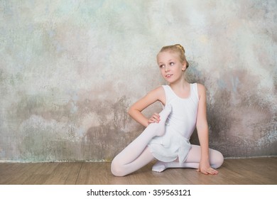 Similar Images, Stock Photos & Vectors of Little ballet dancer sitting ...