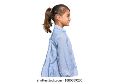 Little Beautiful Girl Wearing Casual Clothes Looking To Side, Relax Profile Pose With Natural Face With Confident Smile. 