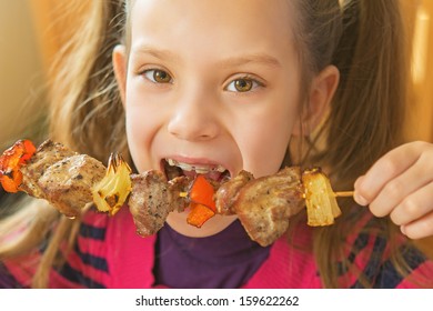 Little Beautiful Smiling Girl Eating Kebab Restaurant.