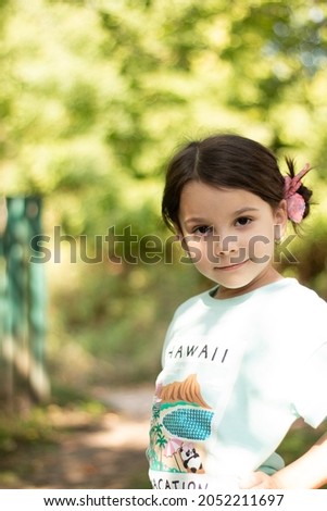 Similar – Image, Stock Photo Adorable little girl combed with pigtails