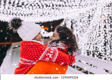 Little Black Girl Enjoying In Ice Skating With Her Mother