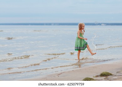 Little Blond Girl Squirting Laughing Seashore Stock Photo (Edit Now ...