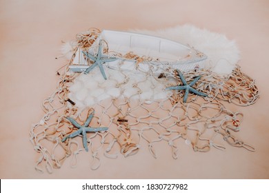 A Little Boat With Starfishes For A Newborn Baby Photo Session