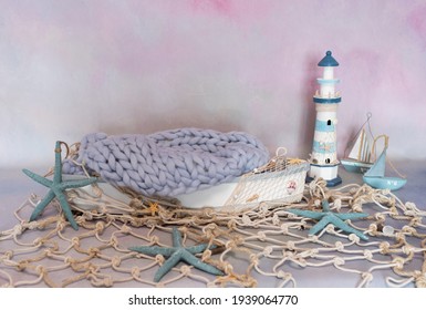 A Little Boat With Starfishes For A Newborn Baby Photo Session