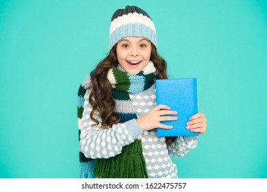 Little Book Lover. Visit Poetry Event. Leisure In Winter Time. Childhood Development. Interesting Information. Library Concept. Reading Skills. Winter Story. Girl Reading Book. Kid Enjoying Book.