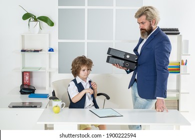 Little Boss. Team Of Business People Having A Meeting. Little Businessman Bossy Child Working In Office. Baby Boss