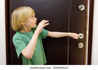 Little Boy Alone At Home. Child Is Opening The Door To Someone. Baby Is Opened Door To A Stranger And Got Scared. Safety Rules Of Kids.