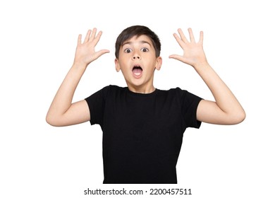 Little Boy Asian Kid Wearing Casual Black Tshirt Scared And Amazed With Open Mouth For Surprise, Disbelief Face