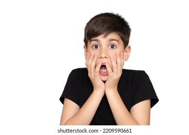 Little boy asian kid wearing casual black tshirt scared and amazed with open mouth for surprise, disbelief face. Isolated on the white background