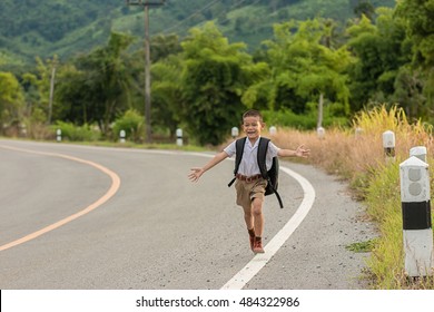 kid running with backpack