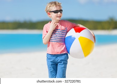 Little Boy With Beach Ball Enjoying Tropical Vacation At Bahamas