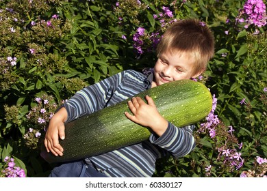 Little Boy With Big Courgette