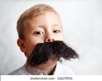 The Little Boy With A Big Mustache