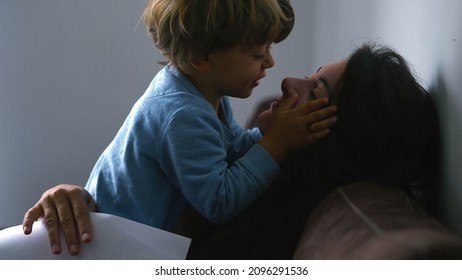 Little Boy Biting Mother Nose, Real Life Authentic Family Moment At Home