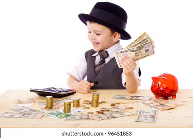 Little boy in black hat and tie at the table counts money, isolated on white - Powered by Shutterstock