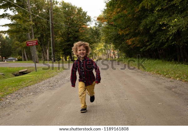 Little Boy Blonde Curly Hair Running Stock Photo Edit Now 1189161808