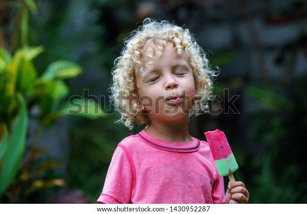 Little Boy Blonde Curly Hair Eating Stock Photo Edit Now 1430952287