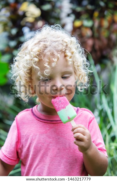 Little Boy Blonde Curly Hair Eating Stock Photo Edit Now 1463217779