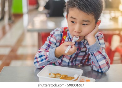 Little Boy Boring To Eat.