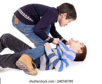little boy bullying classmate isolated in white