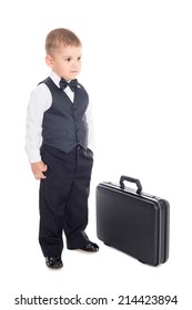 Little Boy In A Business Suit With A Briefcase. 