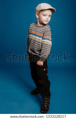 Similar – a little boy is offered a chocolate