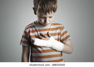 Little Boy In A Cast.child With A Broken Arm.kid After Accident