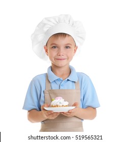 Little Boy In Chef Hat On White Background