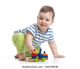 little boy child toddler playing with block toys isolated on white
