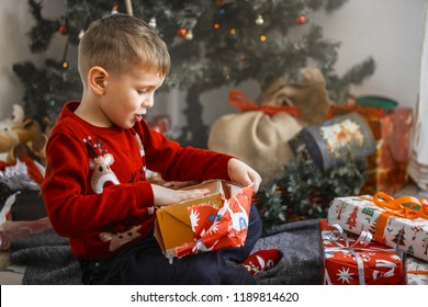 Little Boy With Christmas Gifts