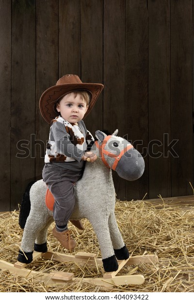 Little Boy Cowboy Hat On Toy Stock 