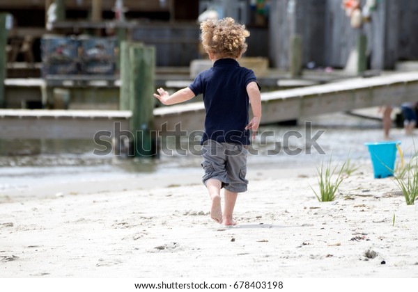 Little Boy Curly Blonde Hair Running Stock Photo Edit Now 678403198