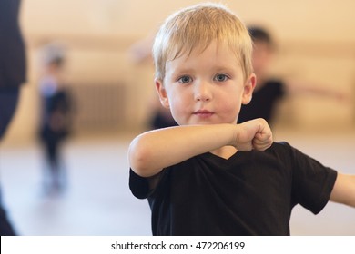 Little boy dancing in the dance school