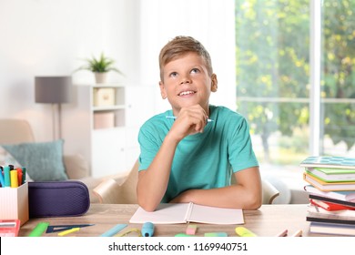 little-boy-daydreaming-while-doing-260nw-1169940751.jpg